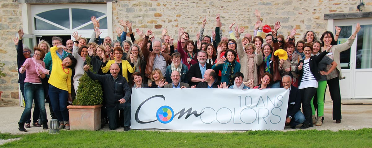 Photo de groupe prise lors de l'événement célébrant les 10 ans de ComColors
